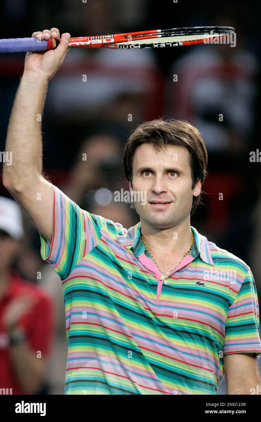 France's Fabrice Santoro reacts after he defeated Serbia's Novak