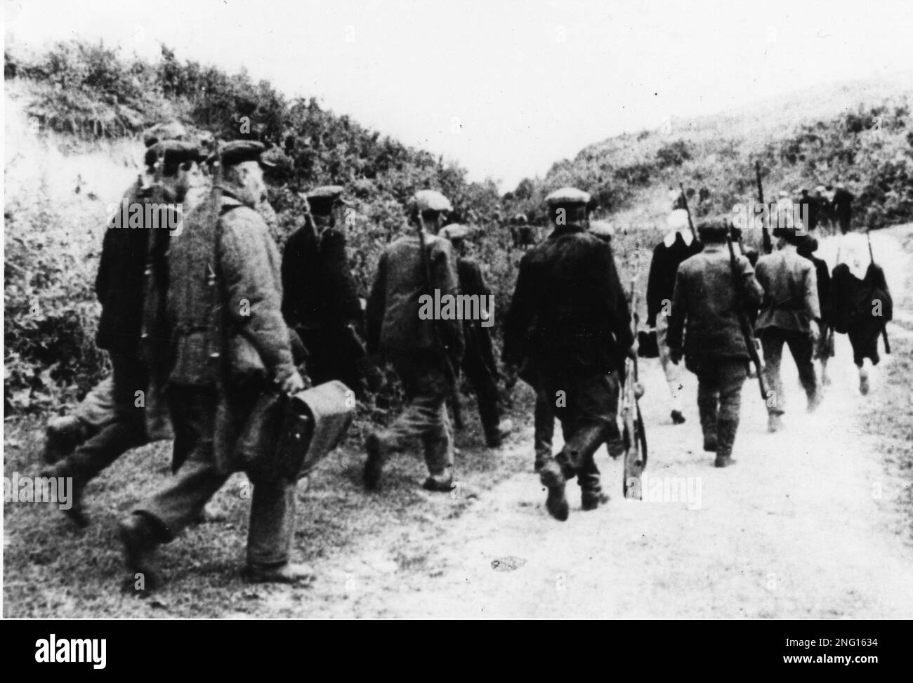 Armed revolutionaries are seen marching in Siberia, Russia during the ...