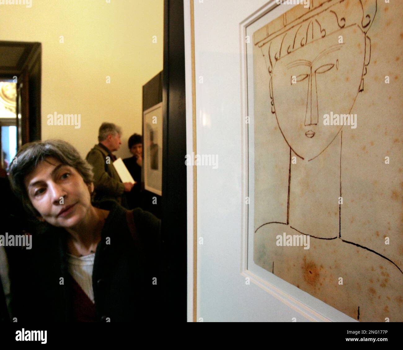 Laure Nechtschein Modigliani, granddaughter of the late Italian artist  Amedeo Modigliani (1884-1920), looks at a drawing \, image size:1300x1130