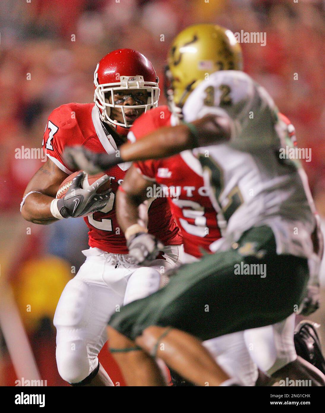 Rutgers' running back Ray Rice (27) follows a block as South