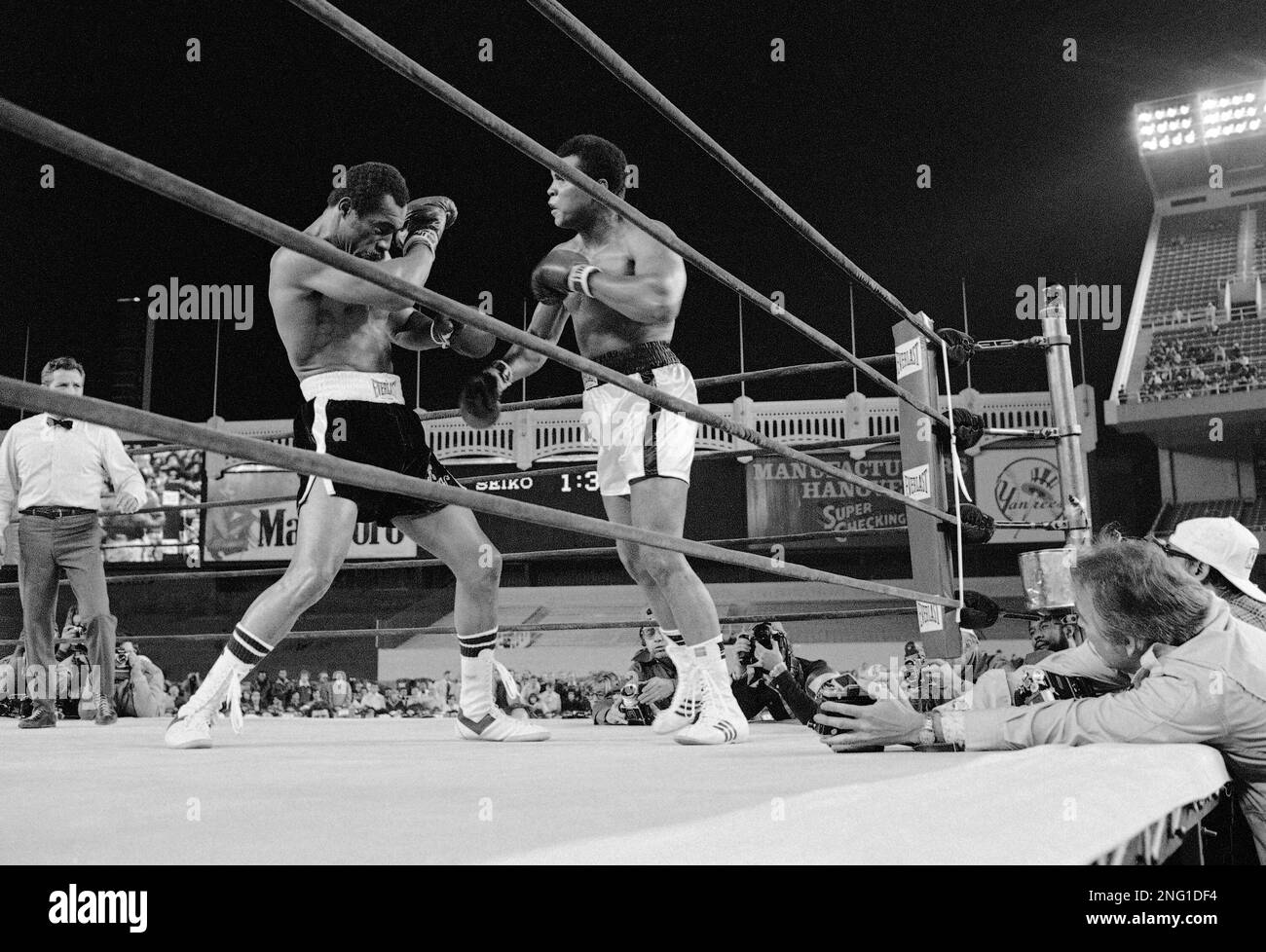 Heavyweight champion Muhammad Ali knocks challenger Ken Norton