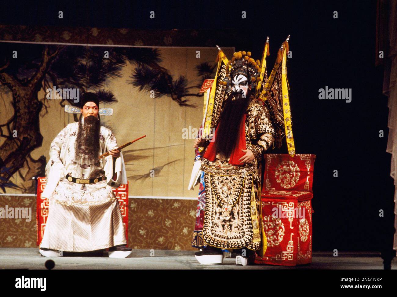 Jingxi Chinese actors in elaborate traditional costumes during a performance ...