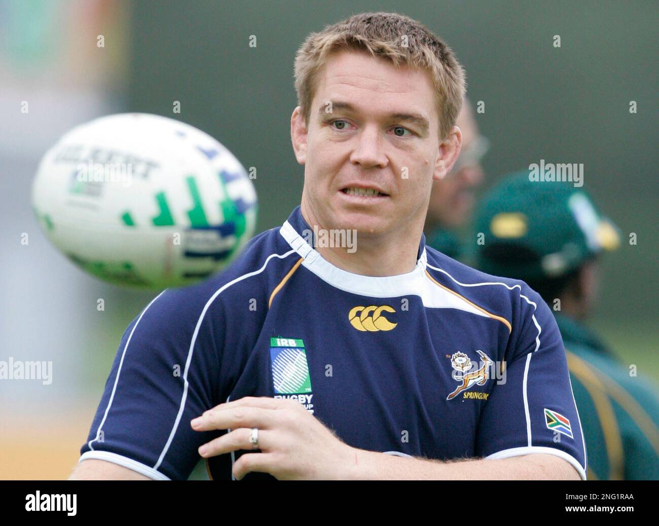 South Africa Rugby Union captain John Smit passes the ball during a squad training session at
