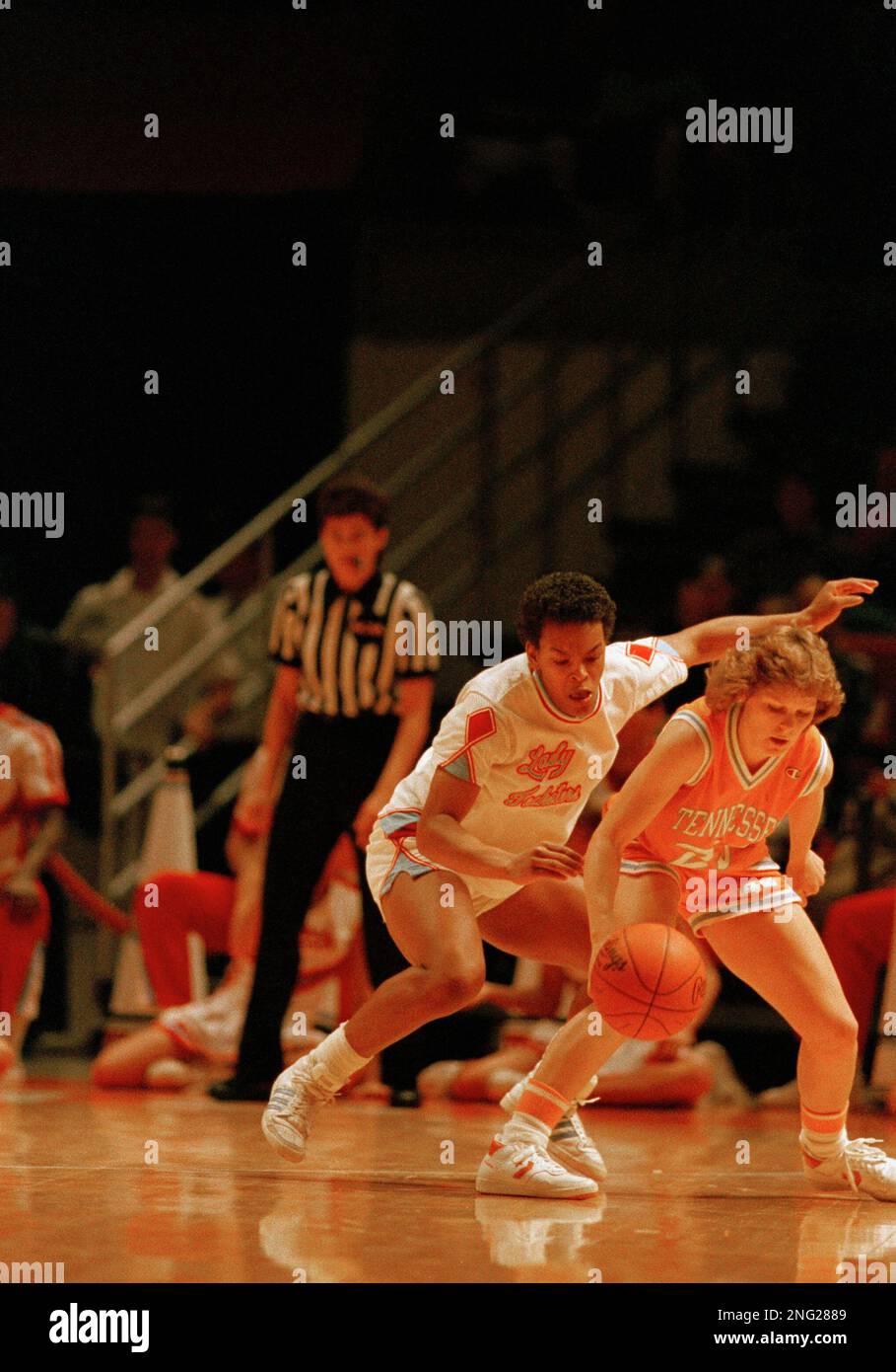 Teresa Weatherspoon (11) of Louisiana Tech tries to knock the ball away  from Shelly Sexton (23) of Tennesse during Sunday, March 30, 1978 NCAA  Women's Final four championship game in Austin. The