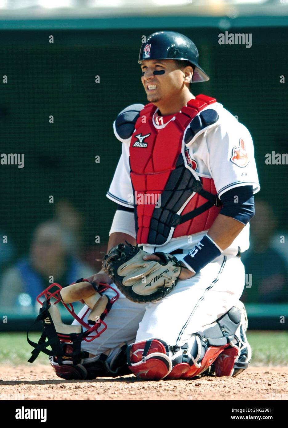 Cleveland Indians' Victor Martinez waits for play to resume
