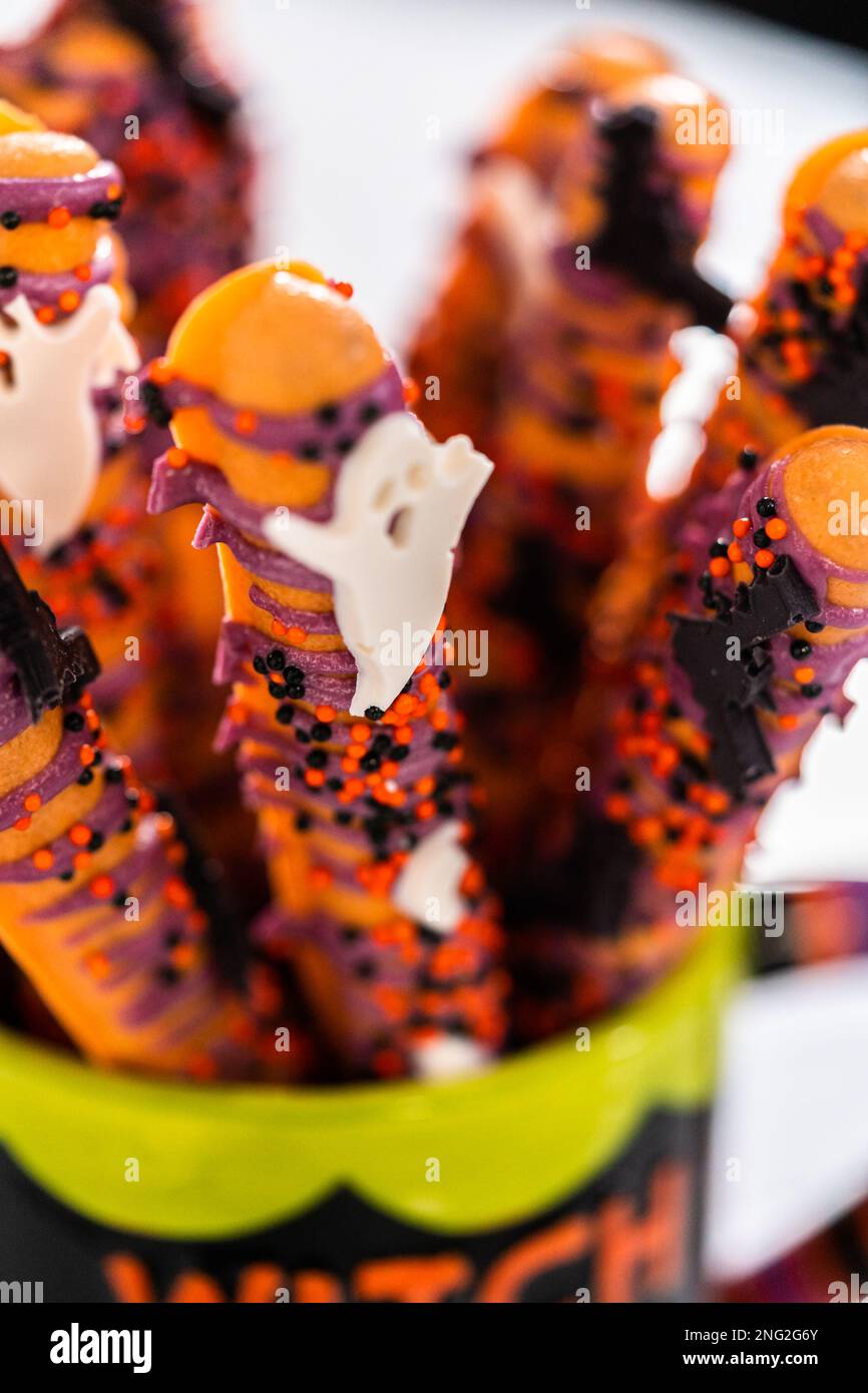 Halloween chocolatecovered pretzel rods Stock Photo Alamy