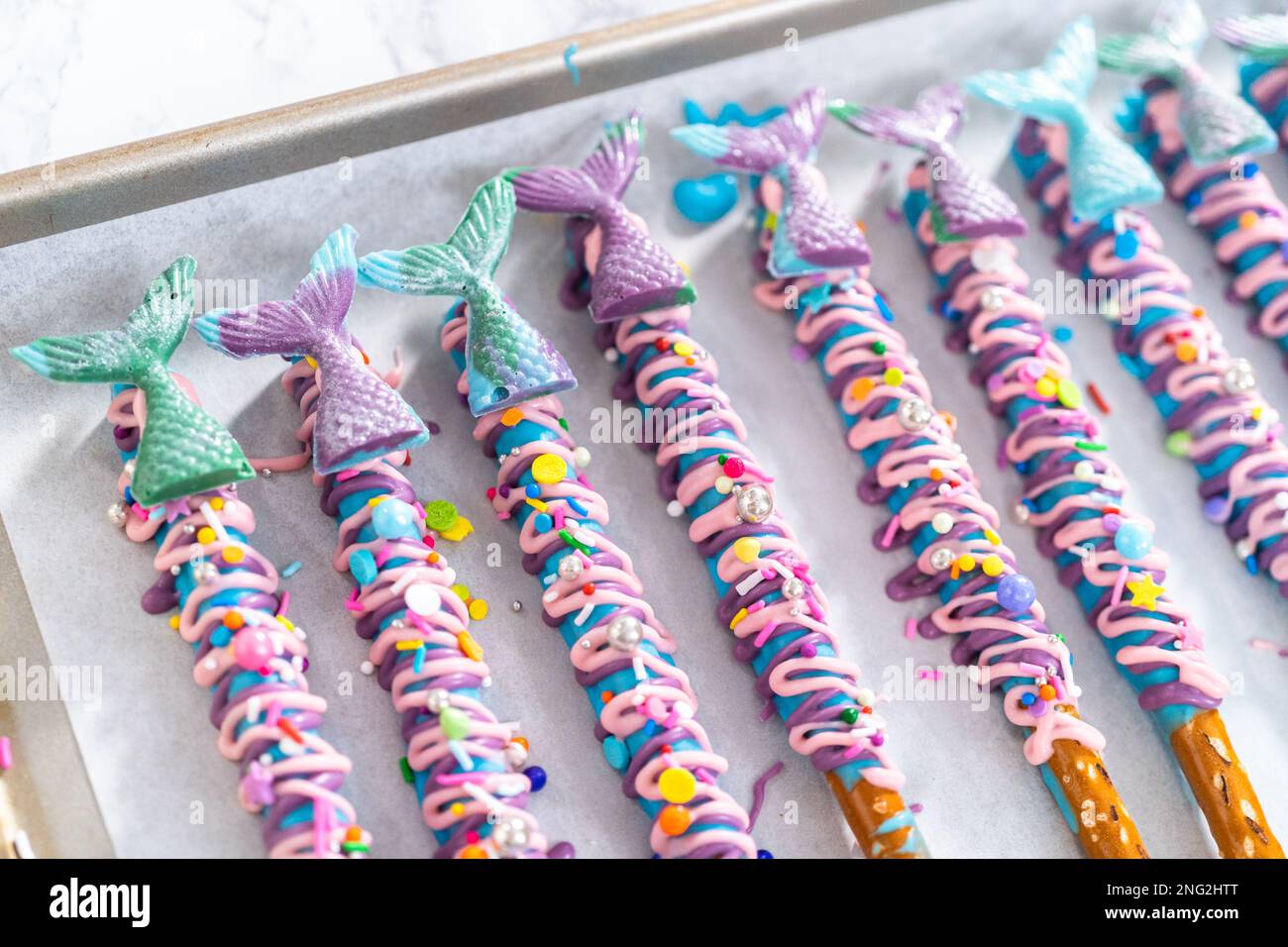 Mermaid chocolate pretzel rods Stock Photo - Alamy