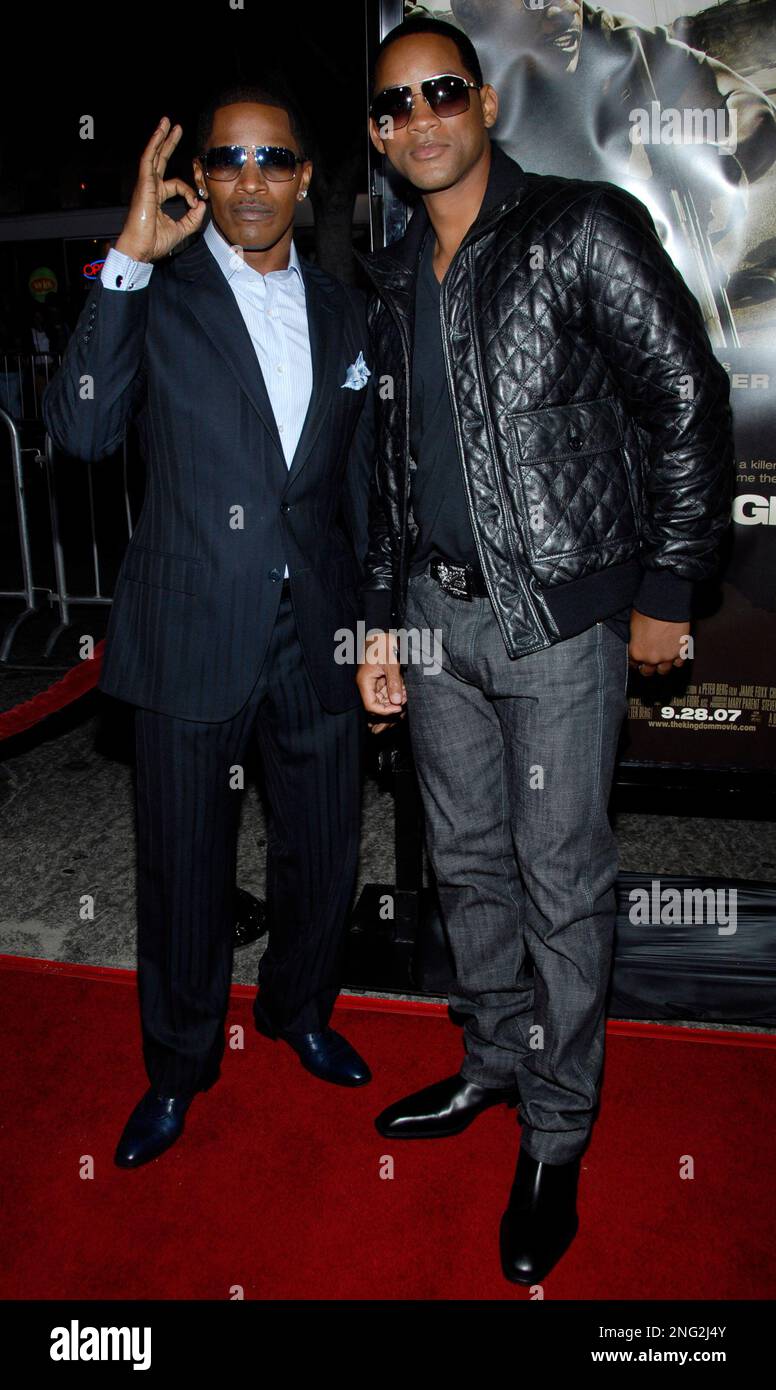 Actor Jamie Foxx, left, and actor Will Smith, right, pose on the press