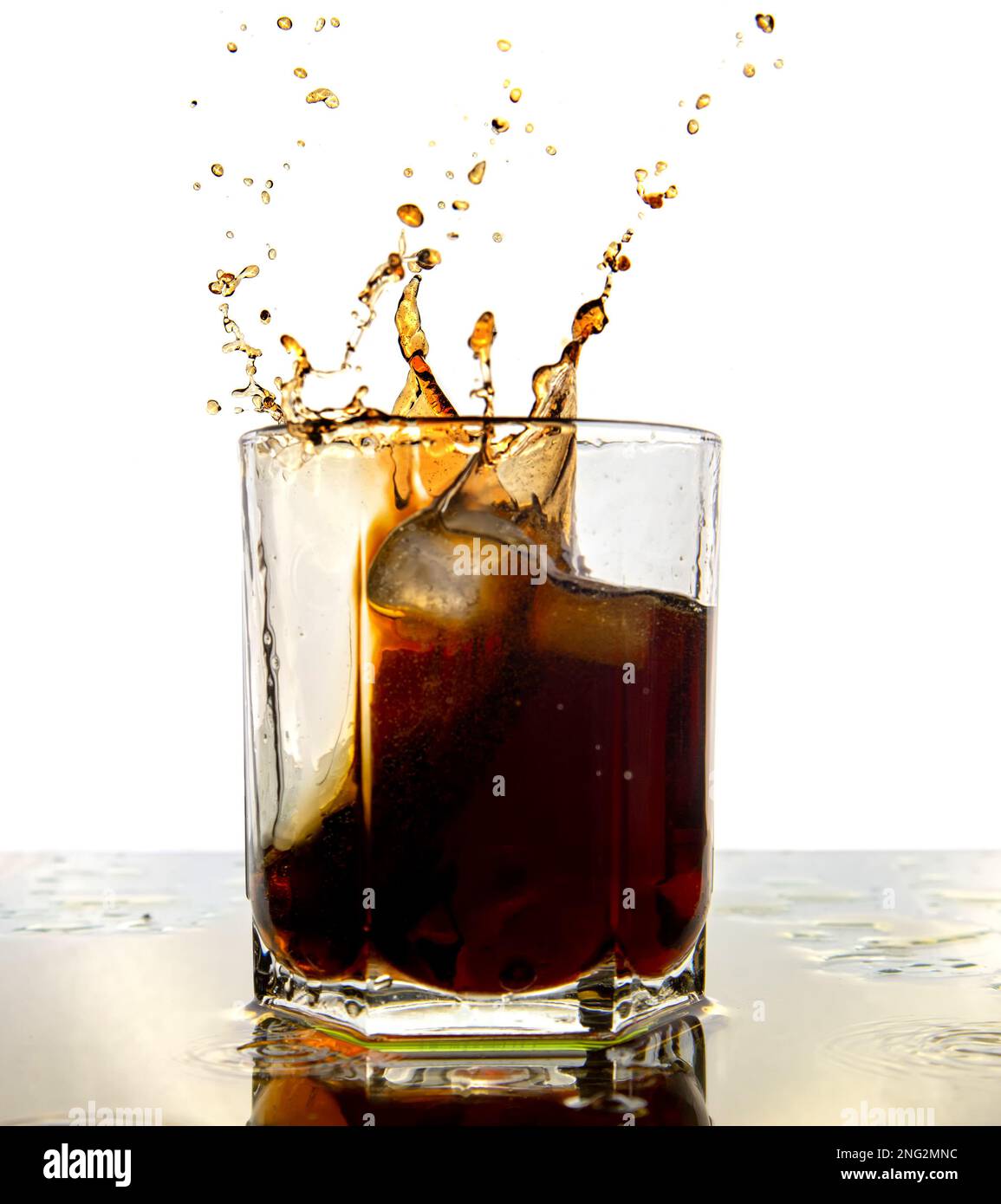 Glass of cola with splash and ice cubes on white Stock Photo - Alamy