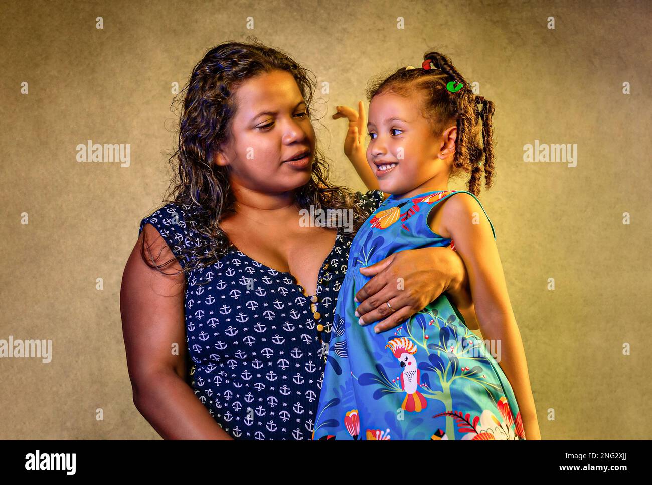 Mother and daughter hugging smiling for portrait, Brazilian black women, curly hair, beautiful