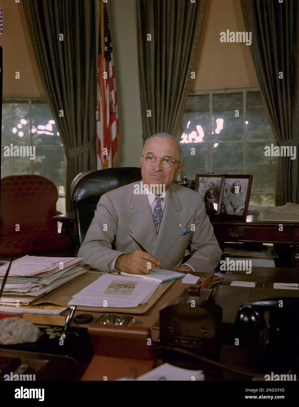 President Harry S. Truman shown in the Oval Office in Washington, D.C ...