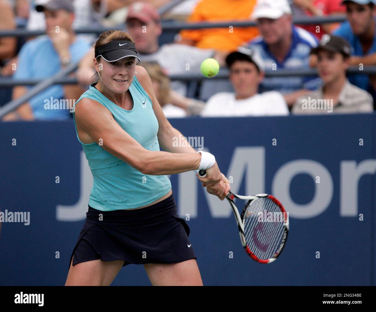 Julia Vakulenko of the Ukraine returns a volley to Daniela Hantuchova