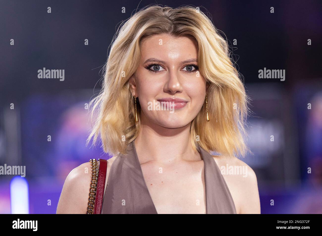 KT Franklin poses for photographers upon arrival for the premiere of