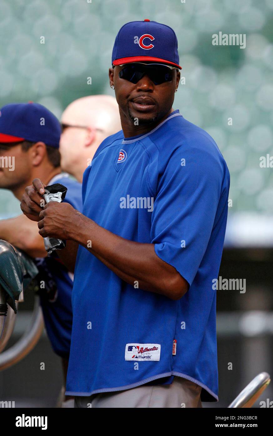 Chicago Cubs outfielder Cliff Floyd looks on during batting practice before playing the Colorado Rockies in a Major League baseball game in Denver on Thursday Aug. 9 2007. AP Photo David Zalubowski St...