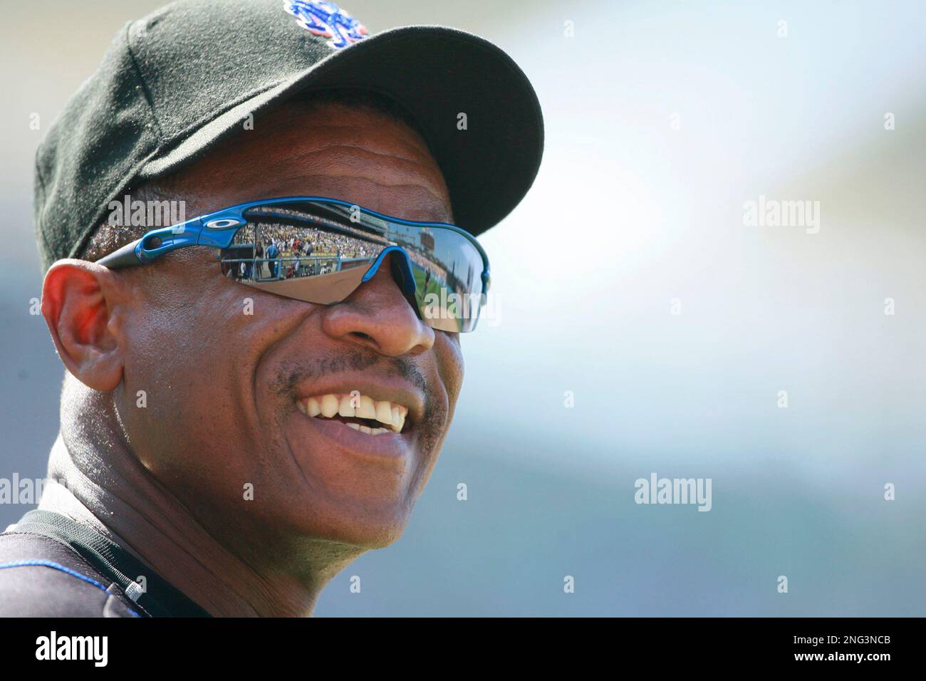 New York Mets coach Rickey Henderson sits in the dugout in Philadelphia on  Thursday, Aug. 30, 2007, after the Philadelphia Phillies swept their  four-game baseball series with an 11-10 win.(AP Photo/George Widman