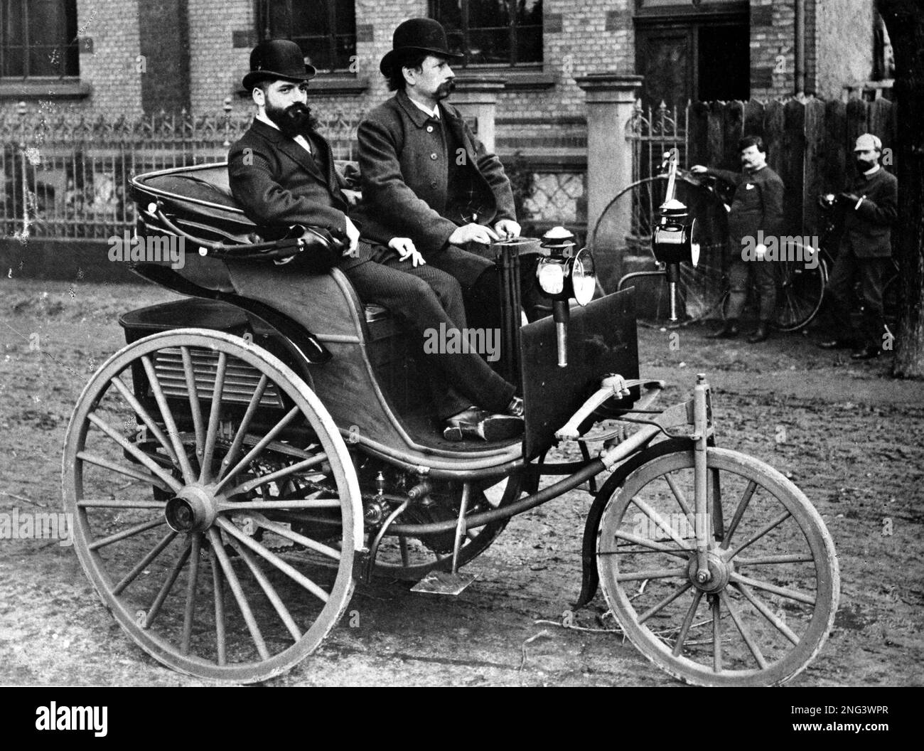 Image shows Karl Benz, right, as he makes first test runs on the ...