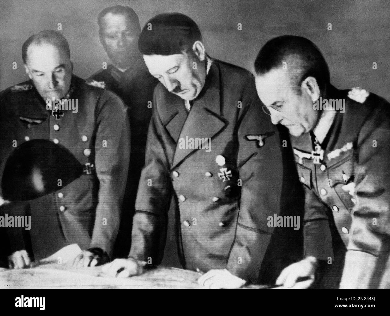 Adolf Hitler, center, confers with Field Marshal General Walther Von ...