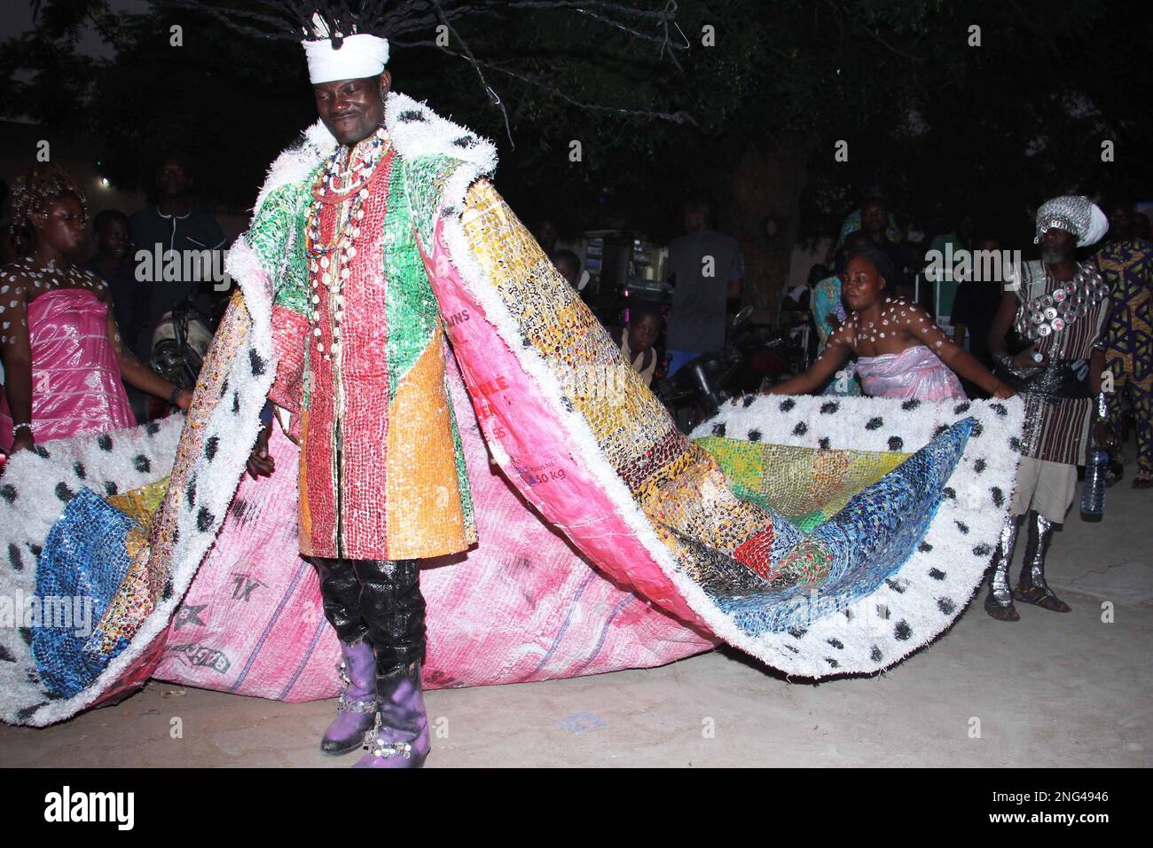 Ouidah, Benin. 17th Feb, 2023. An artist presents an outfit made from