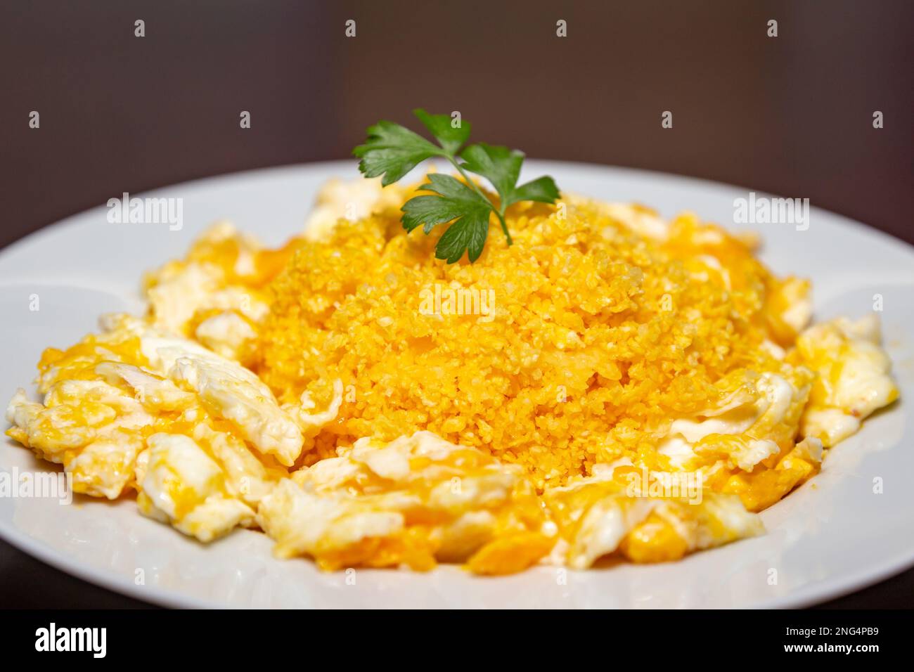 Traditional popular Brazilian dish, couscous with egg garnished with