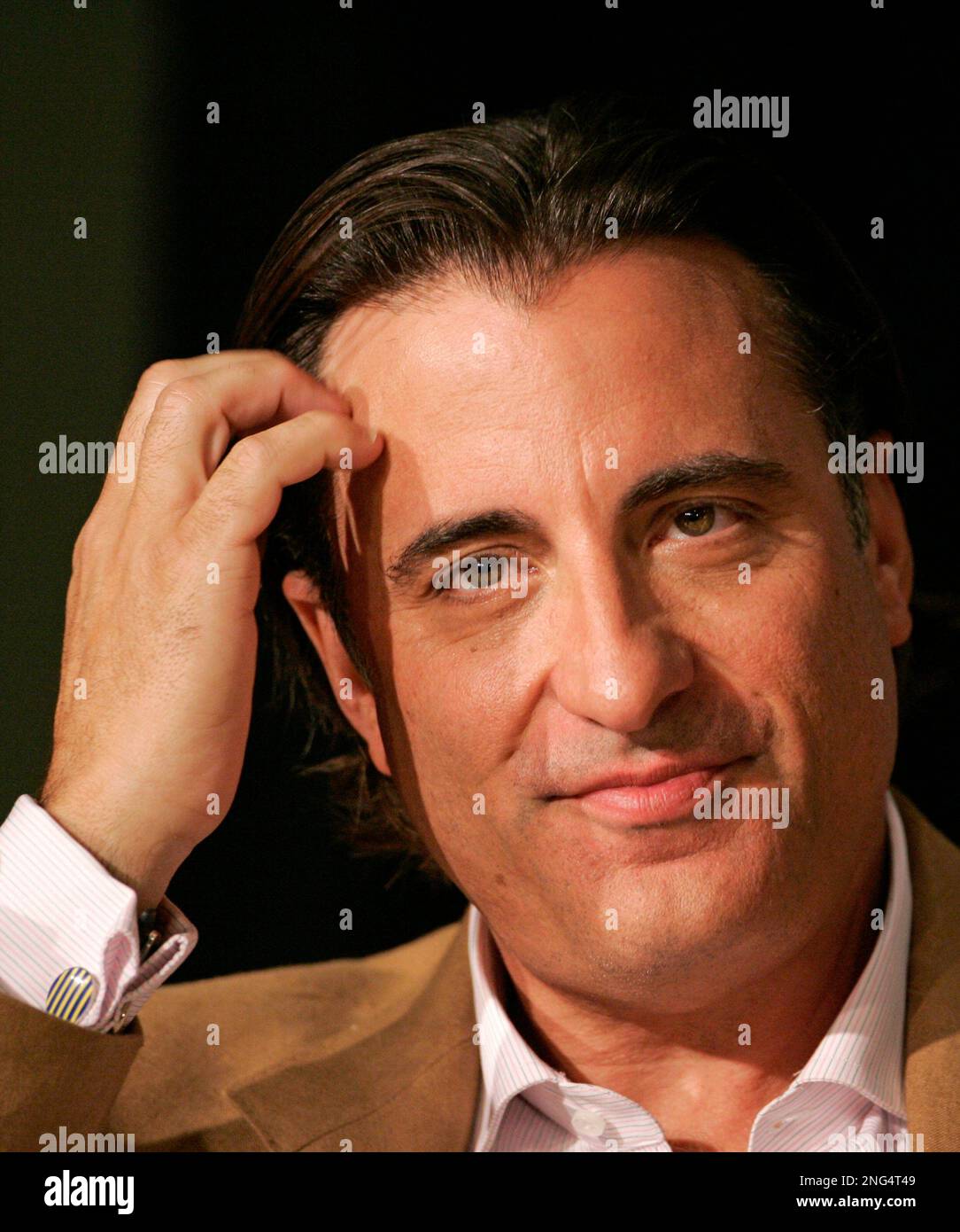 American Actor Andy Garcia Pauses While Speaking During A Press american-actor-andy-garcia-pauses-while-speaking-during-a-press
