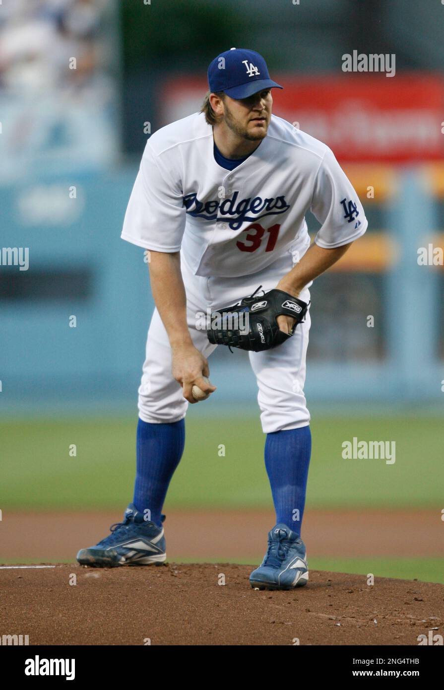 Los Angeles Dodgers' Brad Penny looks for a signal from the catcher in