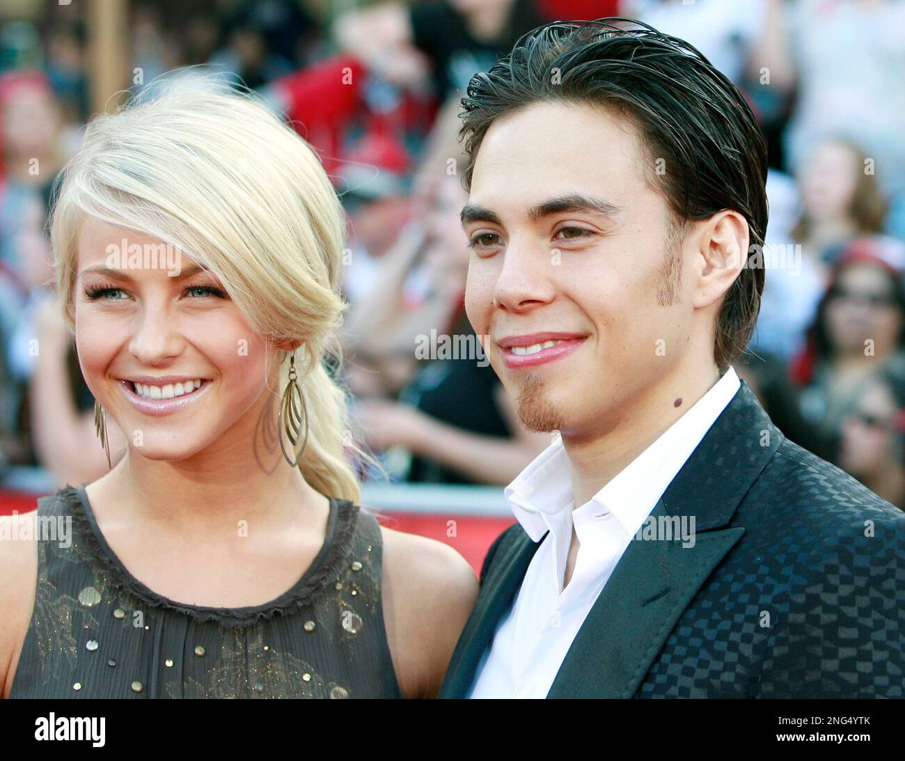 Apolo Anton Ohno, right, and Julianne Hough arrive at the premiere for
