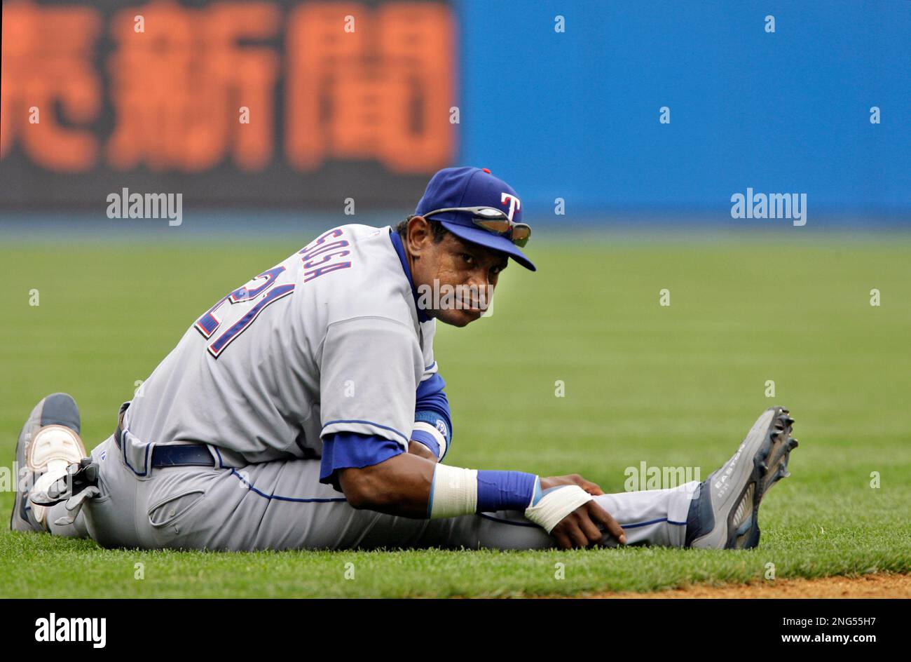 Texas Rangers Sammy Sosa stretches out before the Rangers 14-2 victory over  the New York Yankees in a baseball game at Yankee Stadium in New York,  Thursday, May 10, 2007. Sosa's name