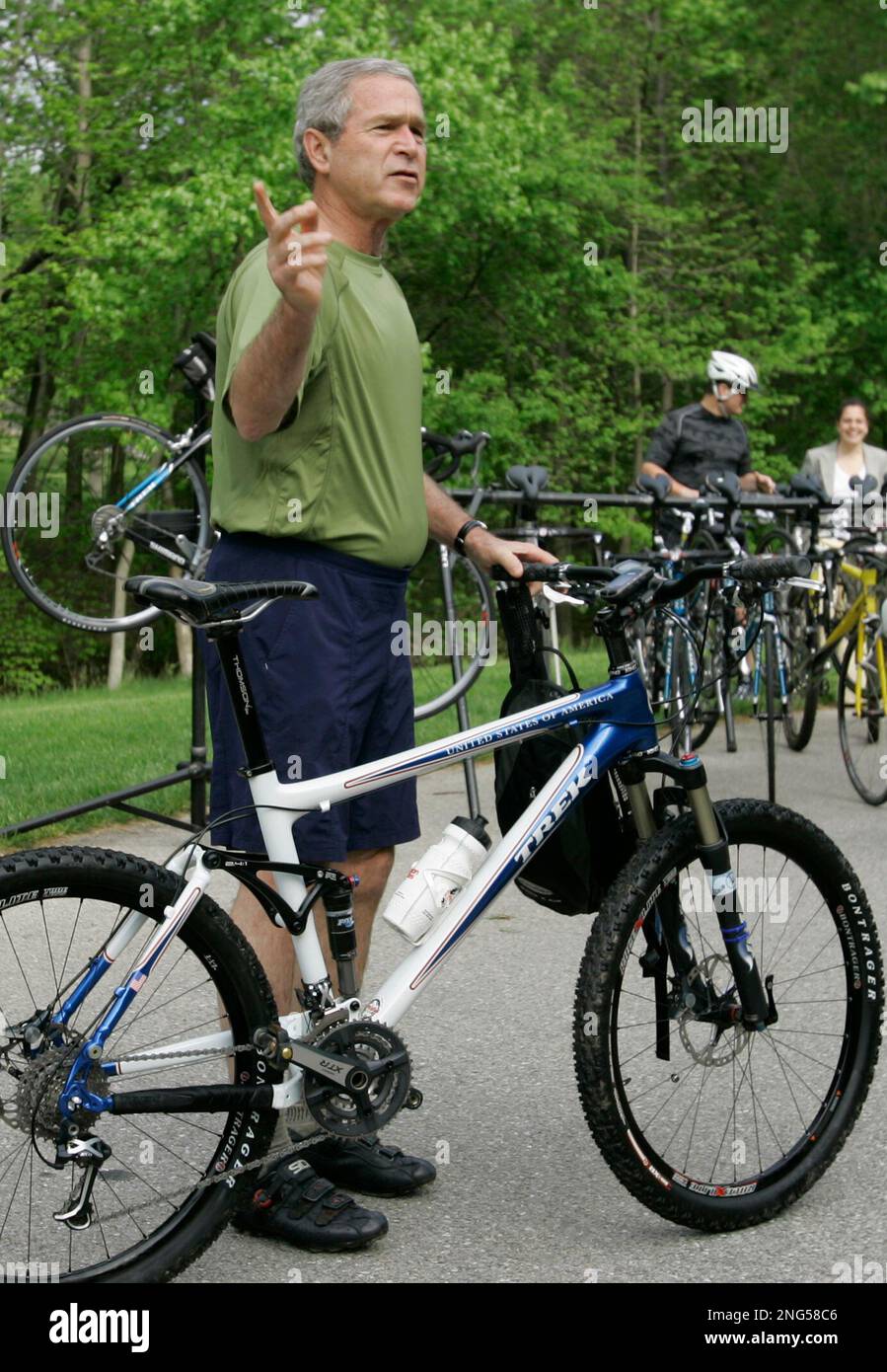President Bush gets ready for his bike ride after he talked about