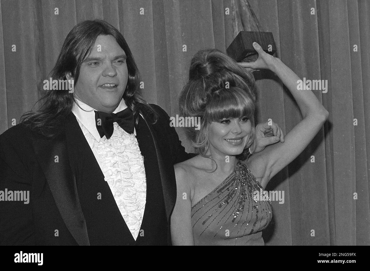 Rock star Meat Loaf is shown with Spanish singer Charo at the American