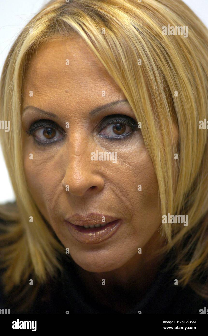 Peruvian international TV host, Laura Bozzo, listens during an interview  with The Associated Press at her home in Lima, Peru on Thursday, April 27,  2006. Bozzo said that her work with Telemundo