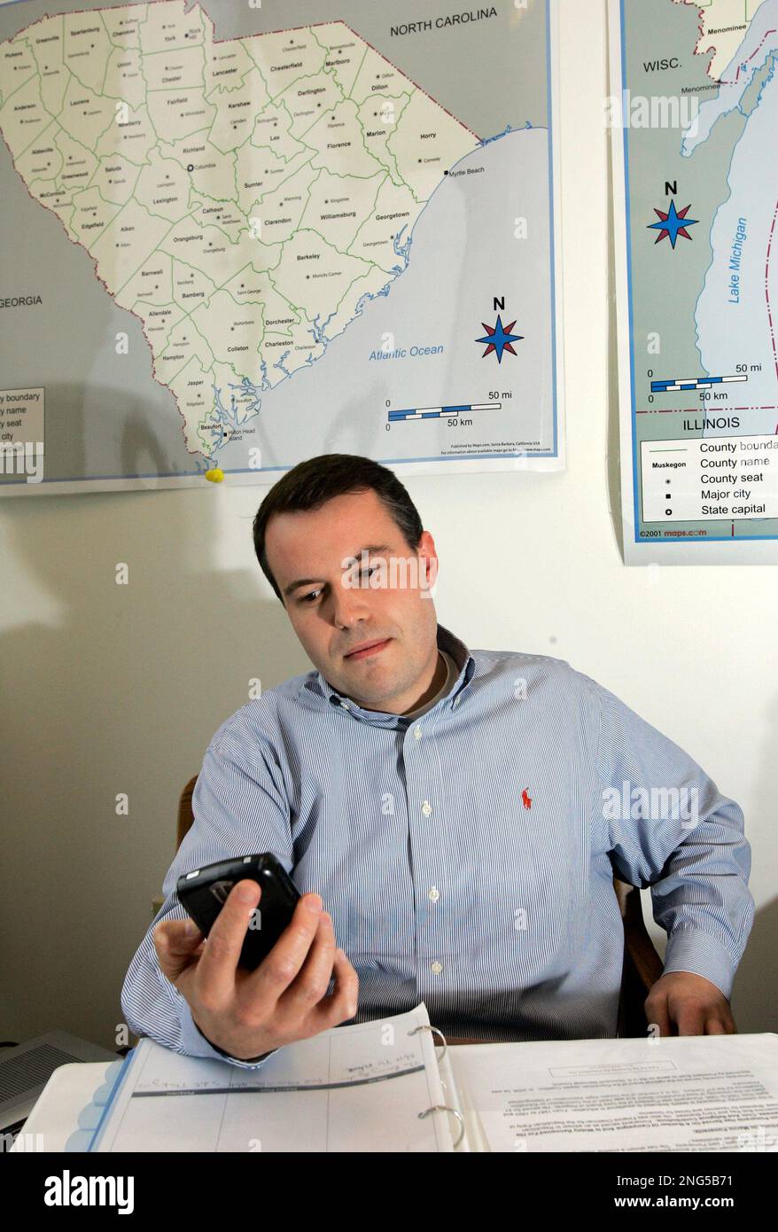 Matt Rhoades, communications director for Mitt Romneys 2008 bid for the  presidency, checks his PDA at the Romney 2008 campaign office in Boston  Friday, April 27, 2007. Rhoades headed up the Republican