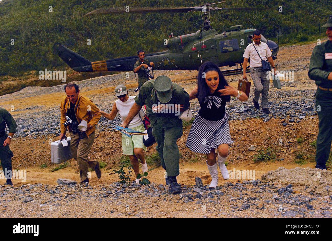 Madeleine Hartog Bell, Miss World of Peru, is shown with Bob Hope and