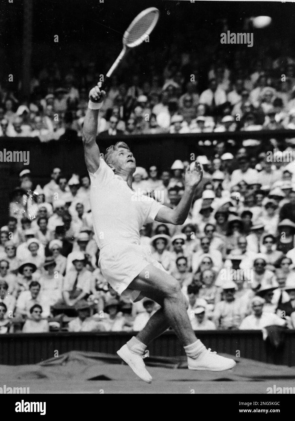 Lew Hoad of Australia makes a leaping return during his title match ...