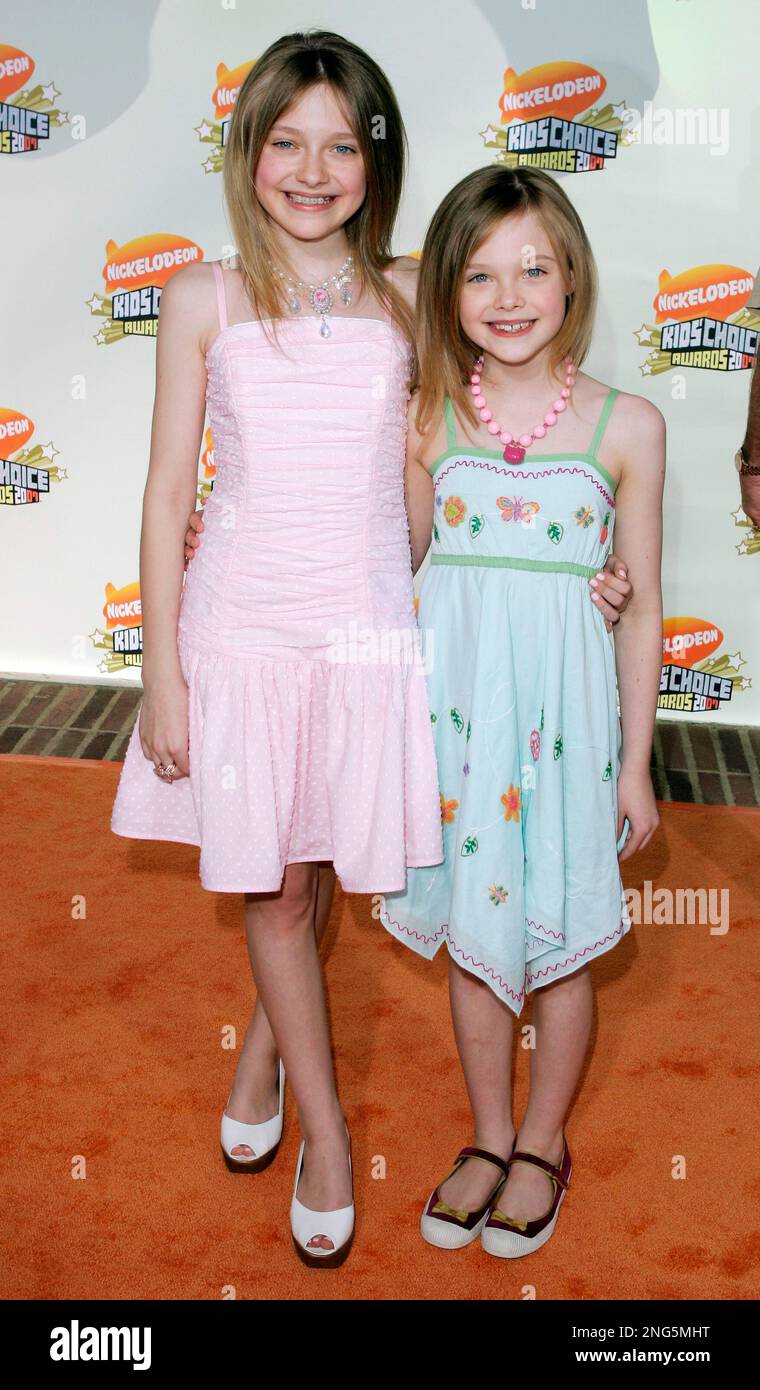 Actress Dakota Fanning, left, and her sister Ellie arrive at the 20th