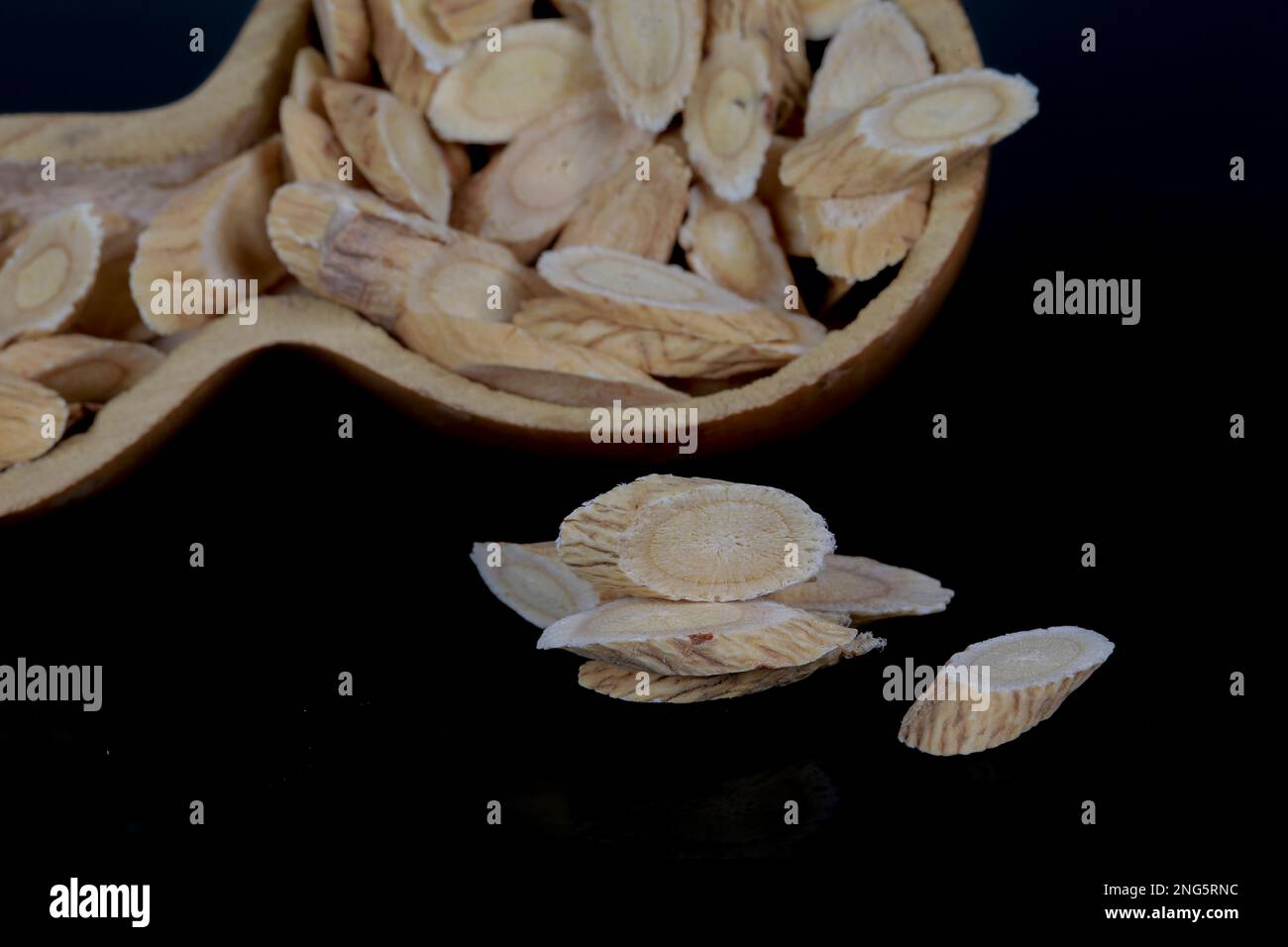 Chinese herbal medicine astragalus membranaceus on a white background