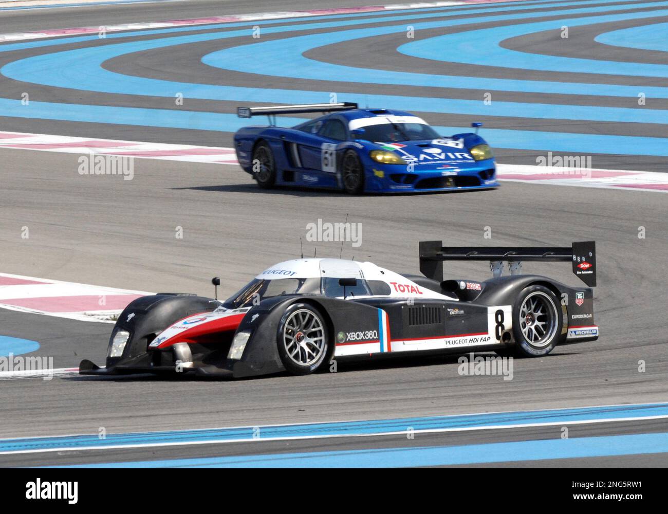 Sebastien Bourdais of France, foreground, steers his Peugeot 908 No. 8 in  front of a Saleen 87-R N61 during an official Le Mans series 2007 test at  the Paul Ricard circuit, in