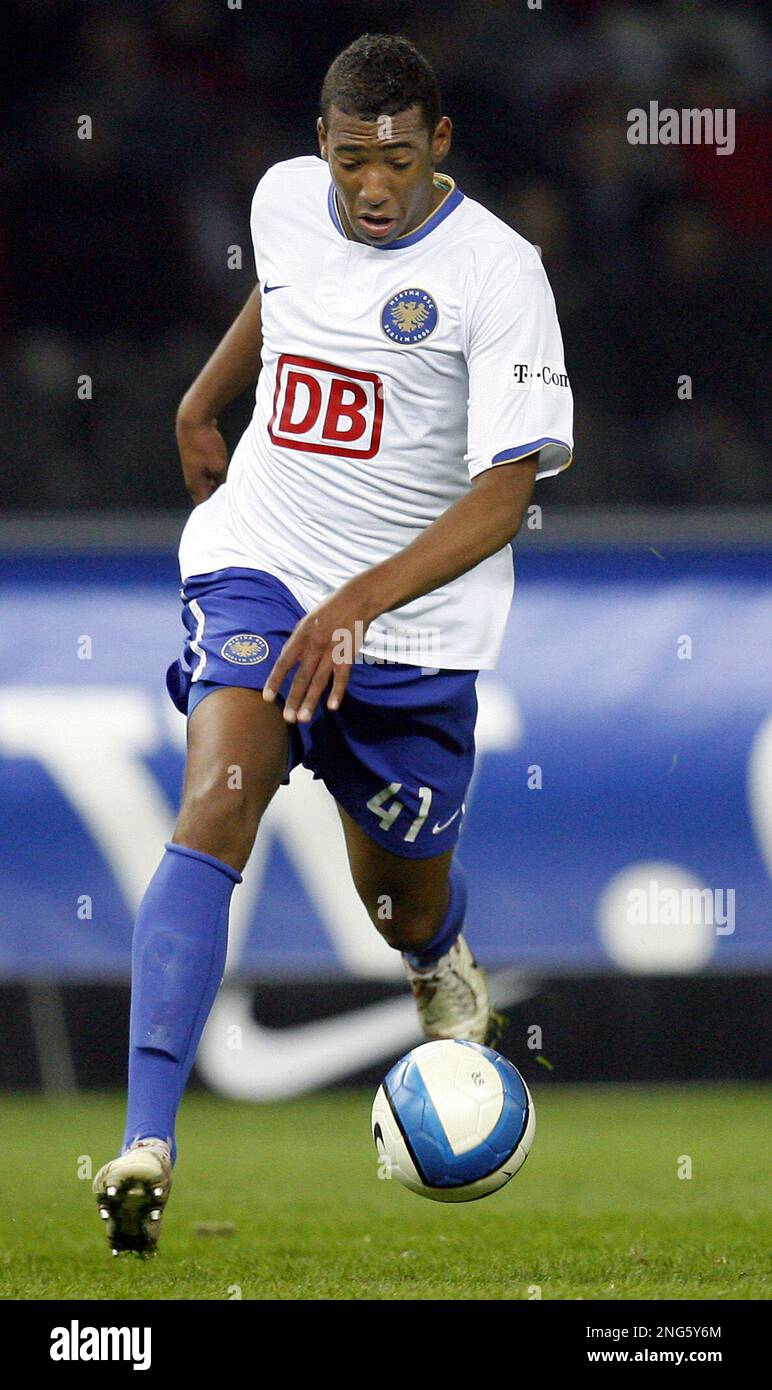 Berlin's Jerome Boateng plays the ball during a German first