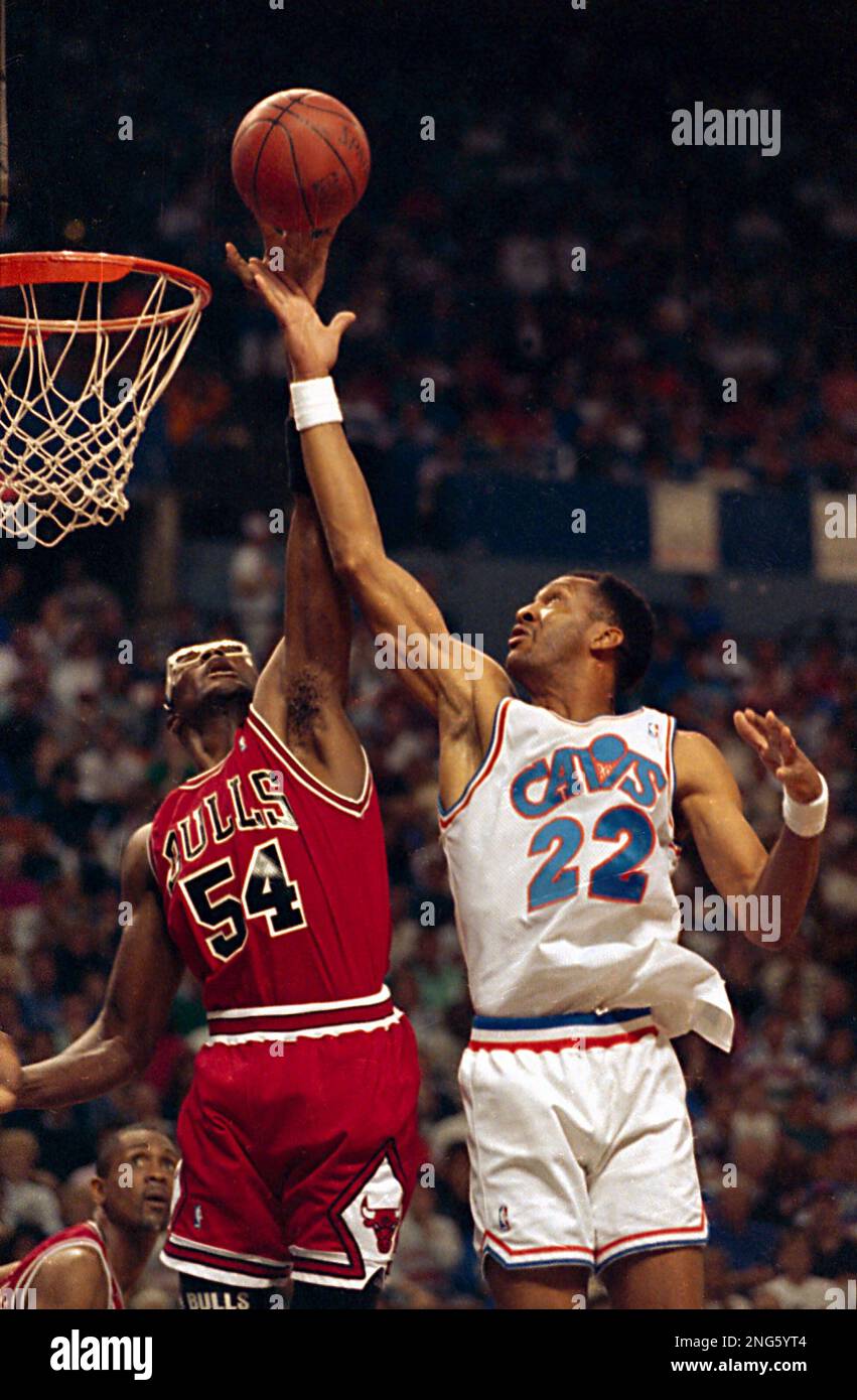The Chicago Bulls' Horace Grant blocks the last-second shot
