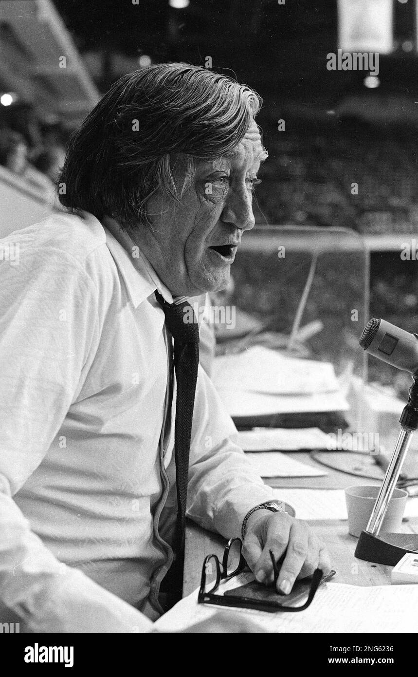 Gravelvoiced Johnny Most broadcasts a recent Boston Celtics game at