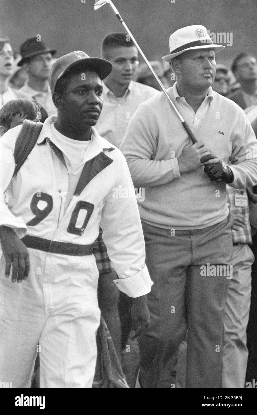 Caddie Willie Peterson and Jack Nicklaus are seen during the Masters