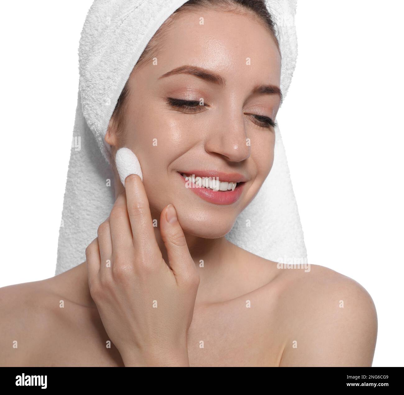Woman using silkworm cocoon in skin care routine on white background ...