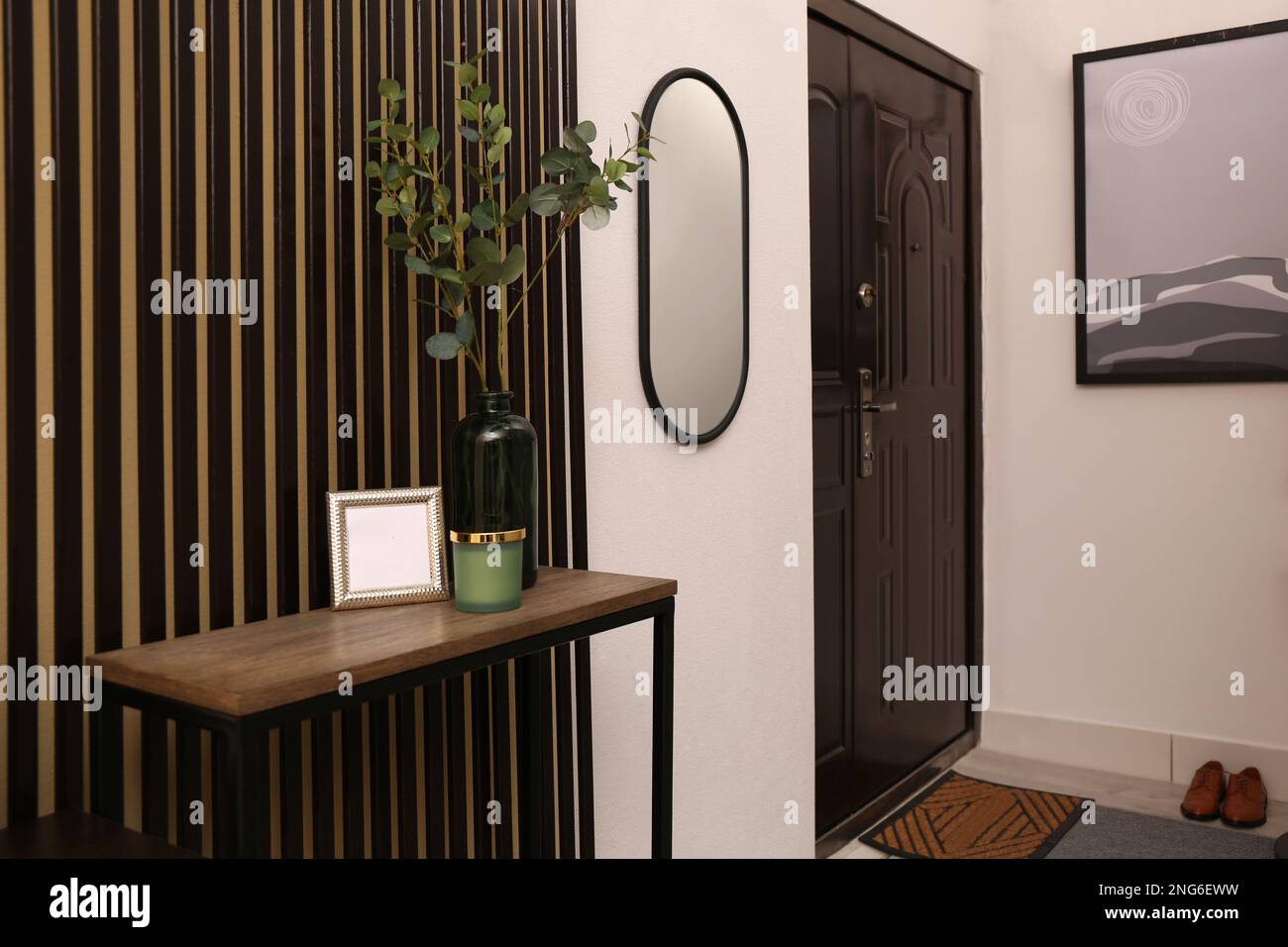 Modern hallway interior with console table and mirror Stock Photo Alamy