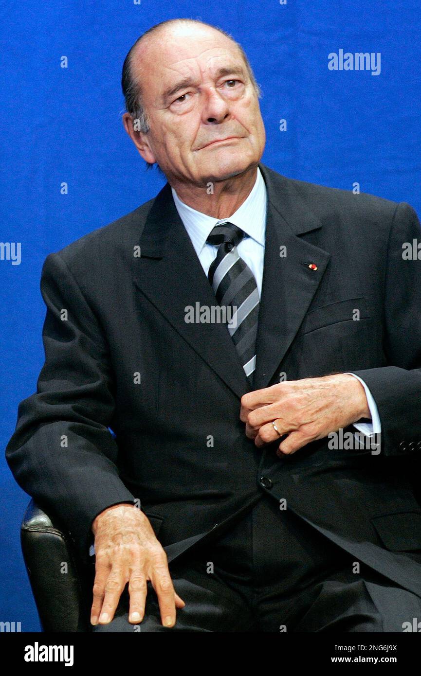 France's President Jacques Chirac looks on during a ceremony marking ...