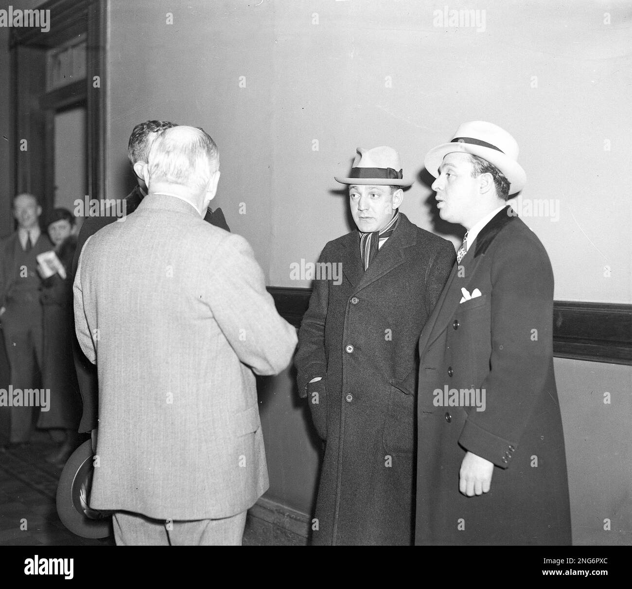 Arthur "Dutch" Schultz, New York gangster, center, is shown in Albany