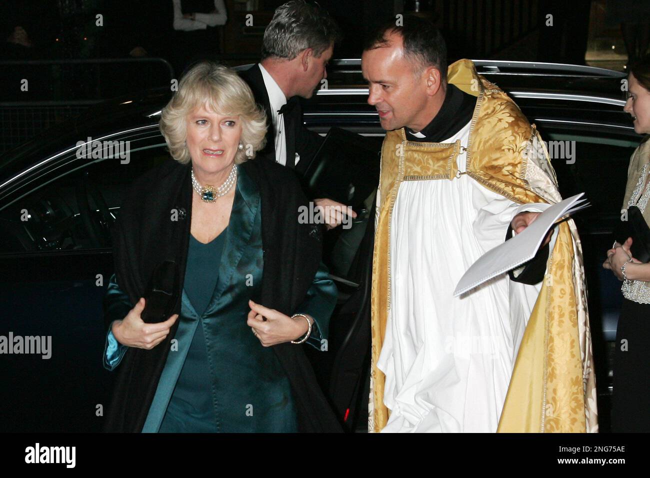Britain's Camilla, Duchess of Cornwall, is met by Rev. Roderick Leece ...