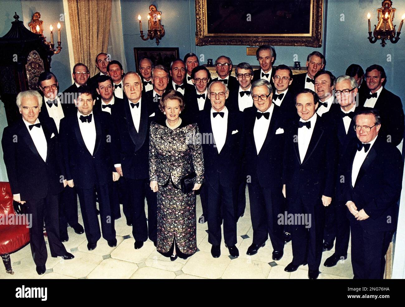 Britain's Prime Minister Margaret Thatcher poses with members of her