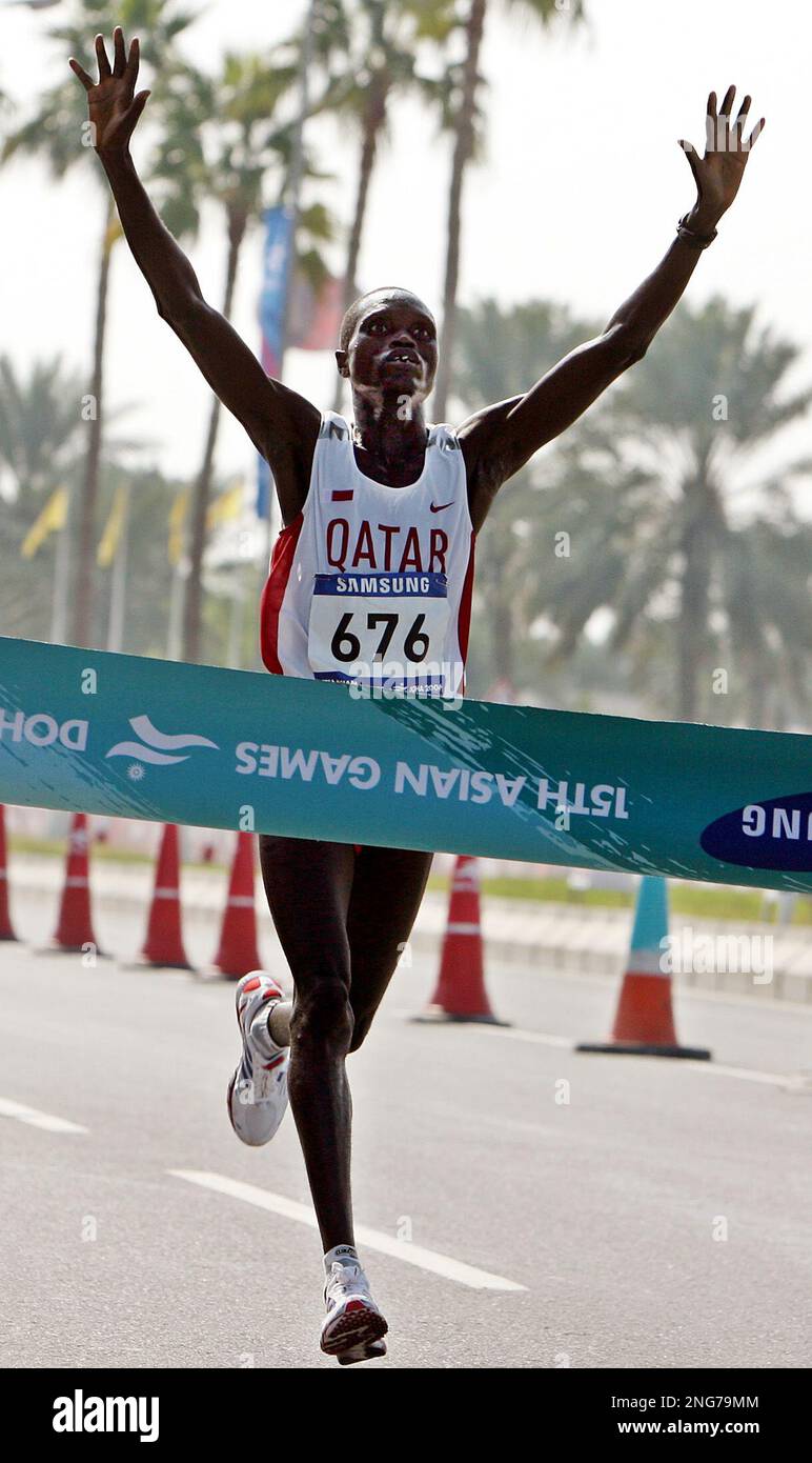Kenyanborn Mubarak Hassan Shami of Qatar crosses the finish at the Men