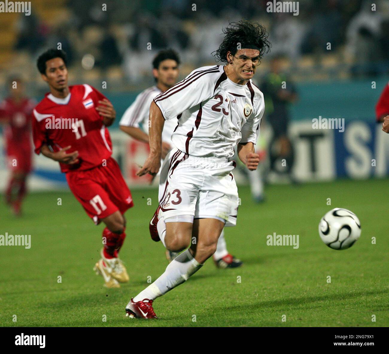 Qatar's Sebastian Quintana controls the ball as Thailand's Sutee