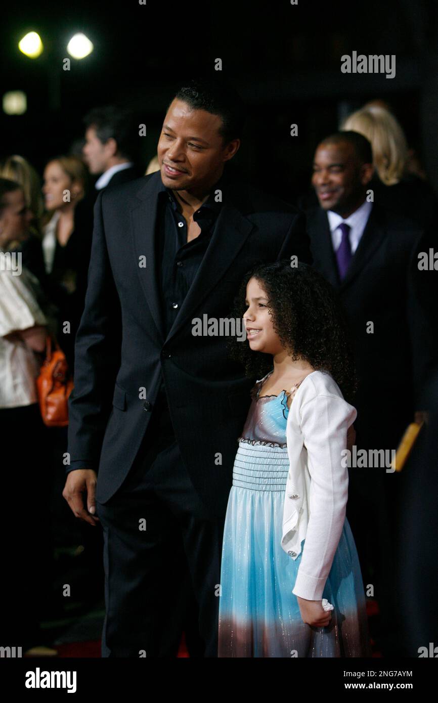 Actor Terrence Howard, left, and daughter, Heavenly arrive at the film