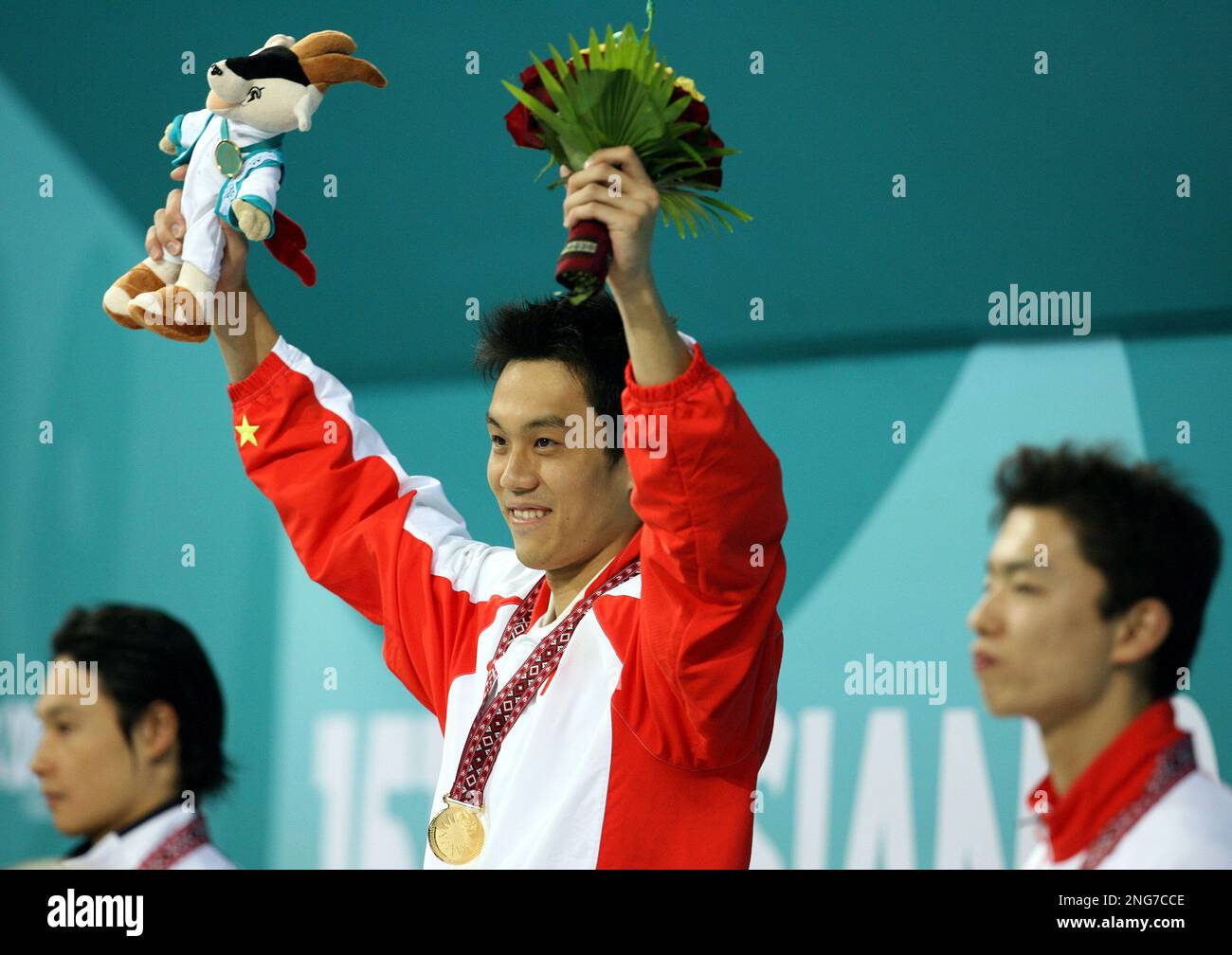 50m Ryo China's Zhou Jiawei, center, the gold medal winner, is flanked at left ...